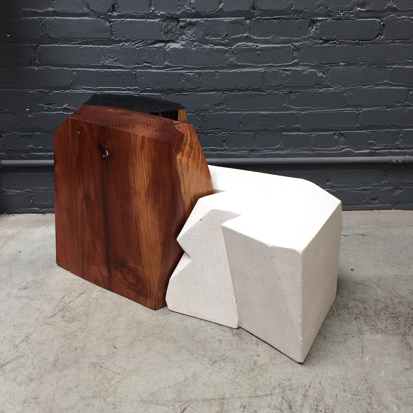 ReUpped. Fire &amp; Ice, 2015. Redwood and concrete, 20 x 36 x 14 in.