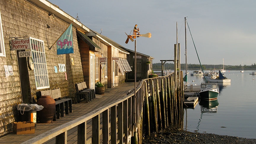 View of the front of Islesford Pottery and the pier.