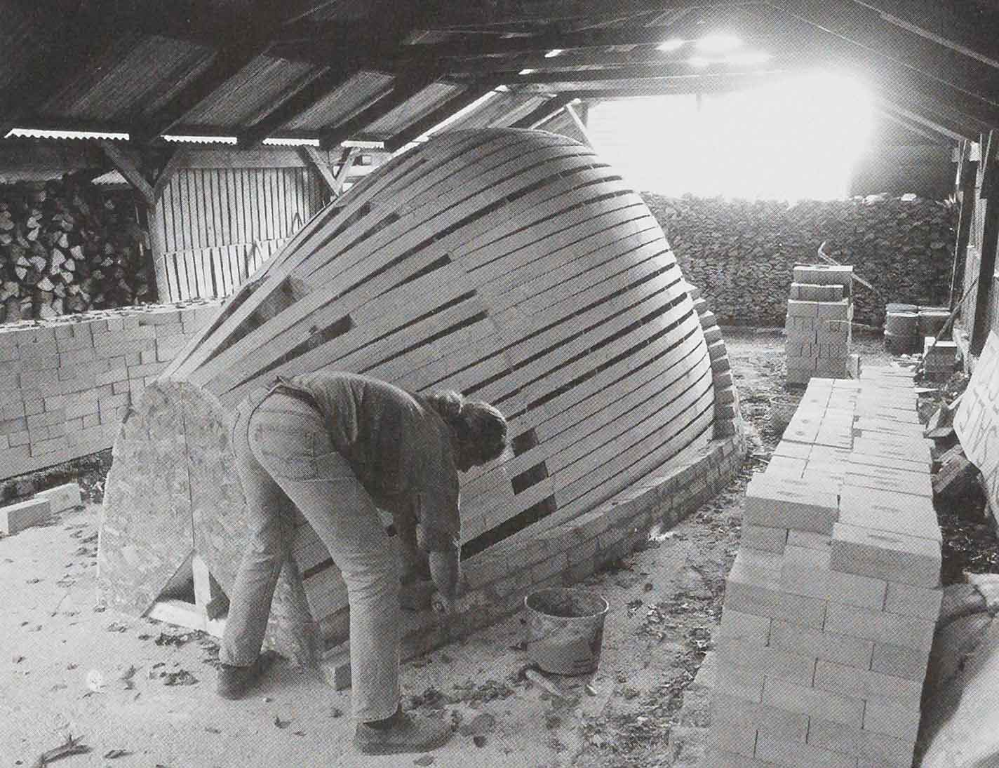 Svend Bayer building his kiln, 1994 