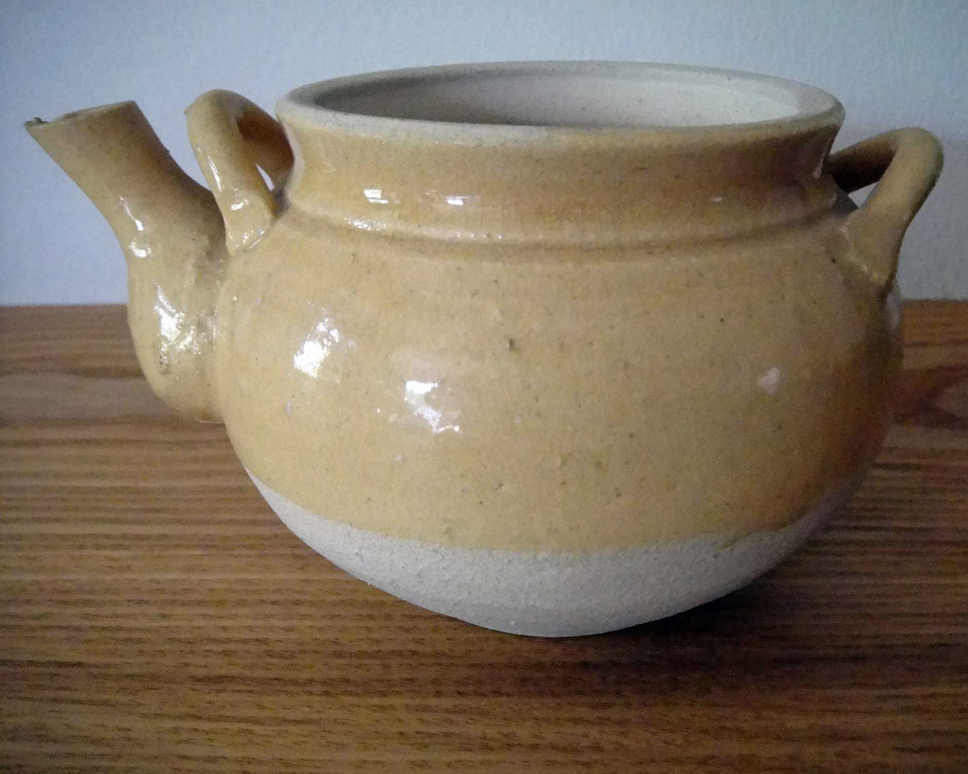 Train teapot made in Shigaraki, circa 1960. Stoneware with feldspar and wood-ash glaze. Collection of Louise Cort.