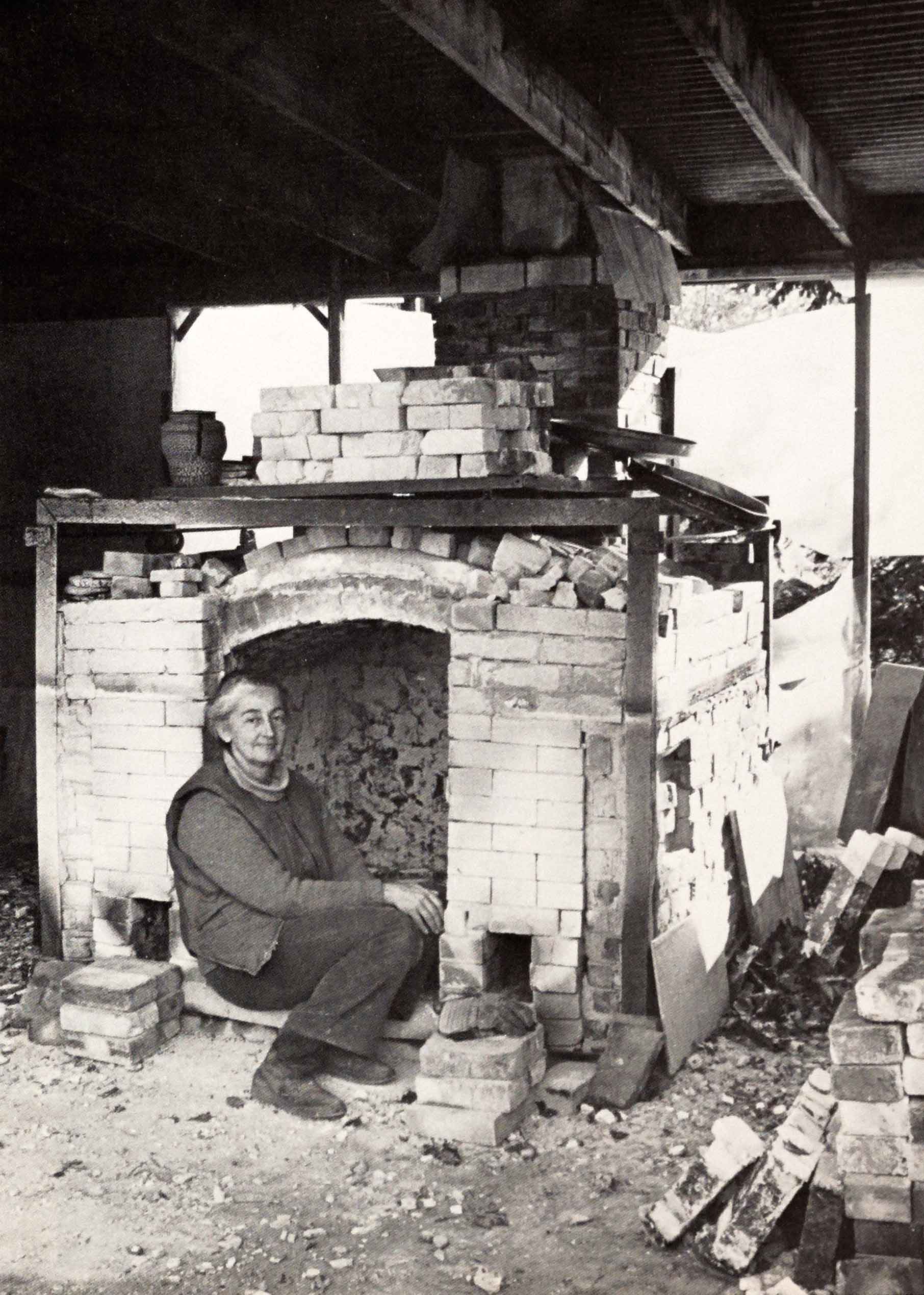 Karen Karnes in front of her salt kiln, 1976. From SP Vol. 5, No. 2.