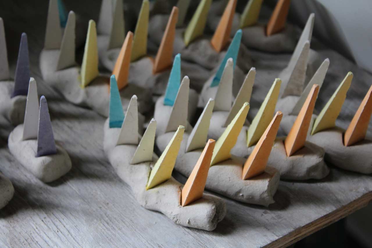 "Cone packs" ready to be placed in the kiln. The Cones help the crew understand the heat-work on the pots inside the kiln.