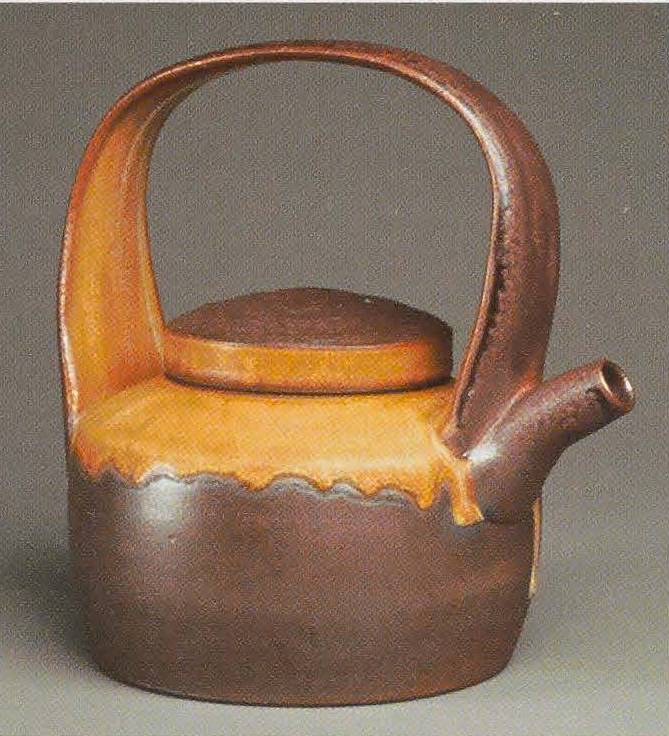 Teakettle/Teapot, 2007. Glaze and naked exterior with soda/wood surface, 9 x 6&quot;x i2in