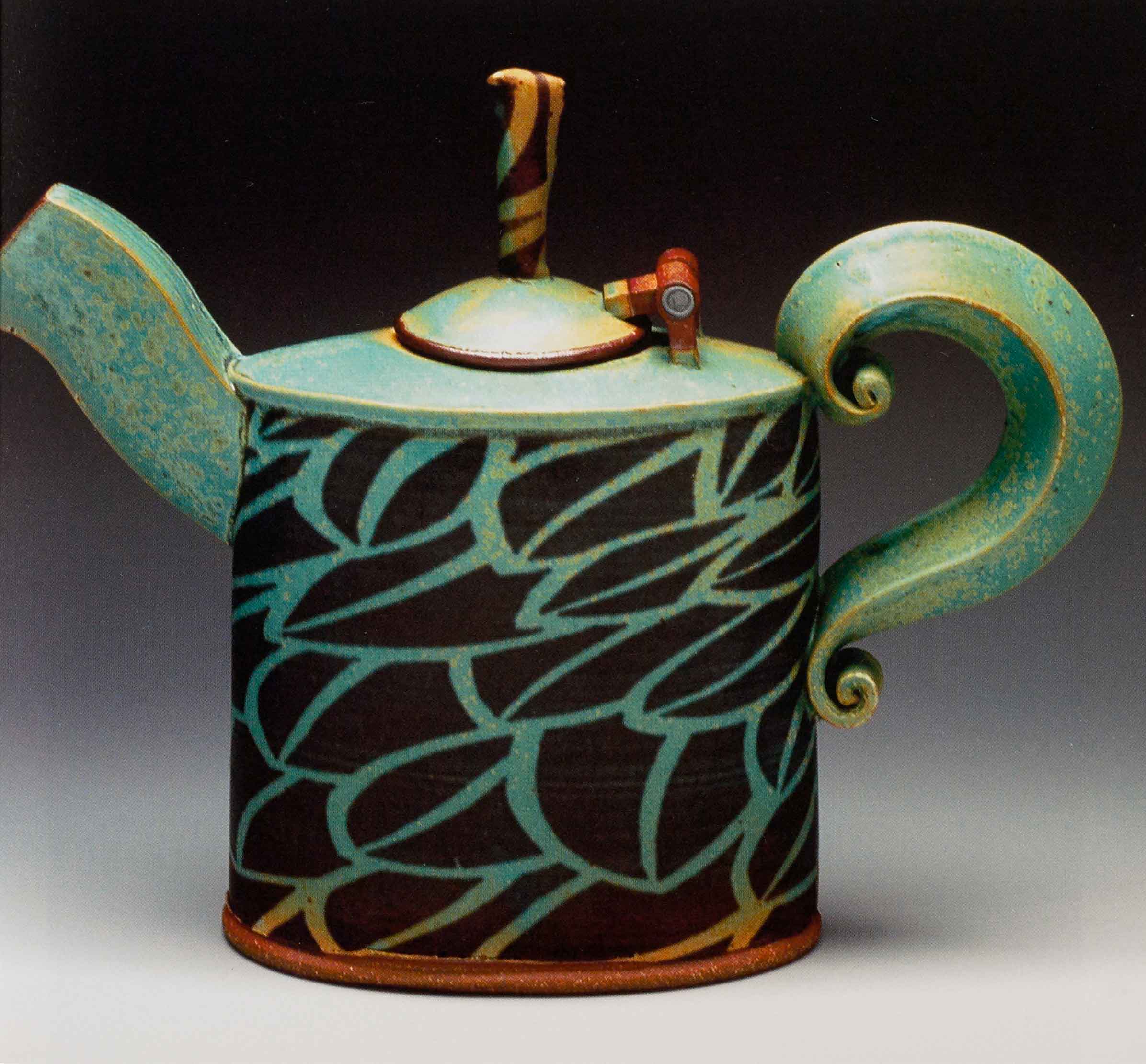 Teapot 10 inches tall. 2006. Stoneware, inlaid black slip, stretched slabs and extrusions, copper matt glaze, Cone 10 reduction.