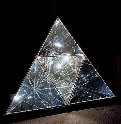 Harriet Brisson. Kaleidoscope 2001. Two-way mirror plexiglas, chrome-plated steel, halogen lights, 96 x 100 in. From Brisson&#039;s 50NOW Retrospective Exhibiton Catalog. 