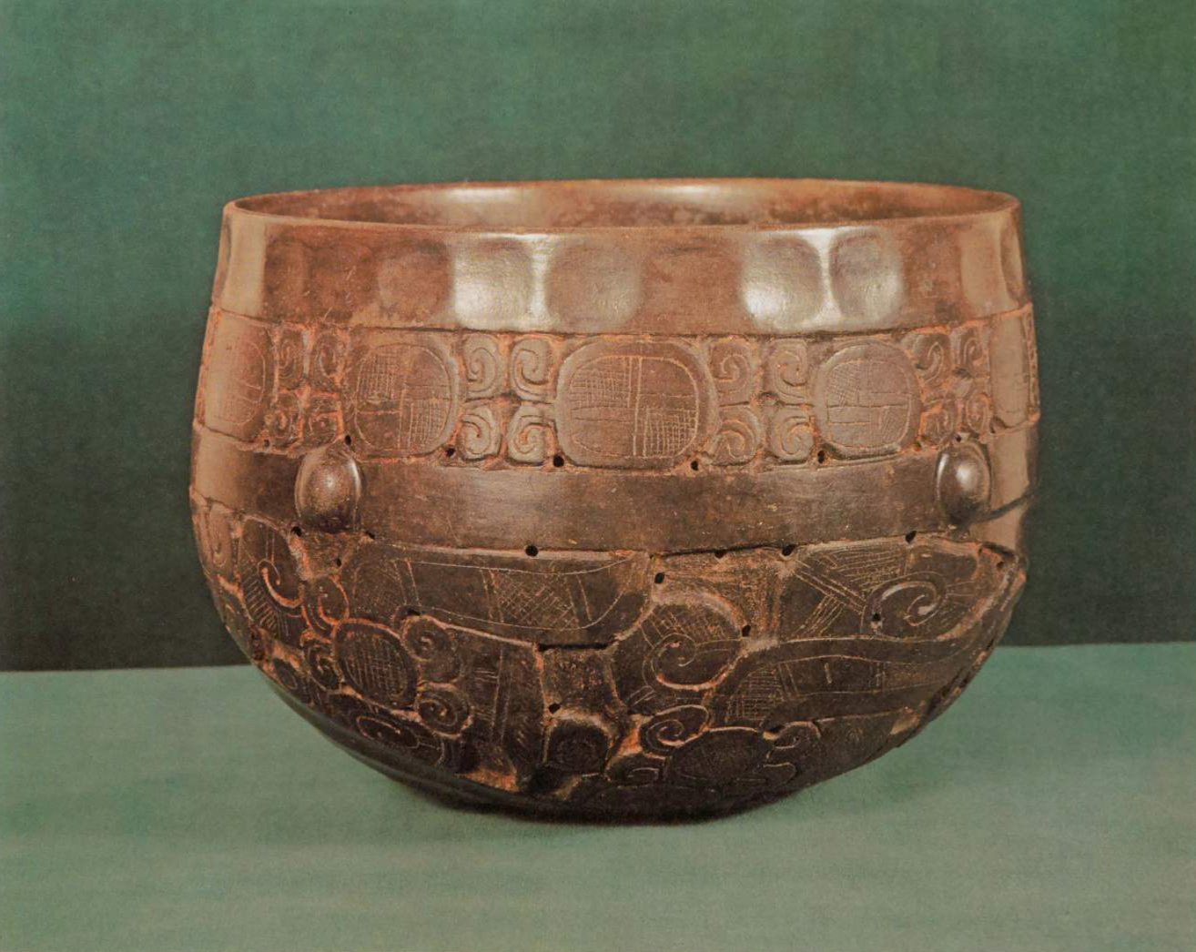 A Carved and Incised Bowl with a Double Bottom 7 1/8