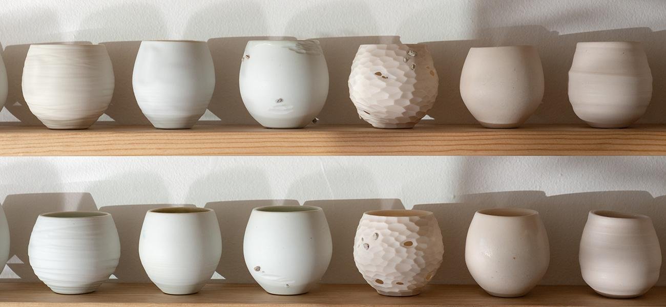 Details of cups from 365 piece installation “A Year and A Day” in the gallery. Image courtesy of Ty and Chey.