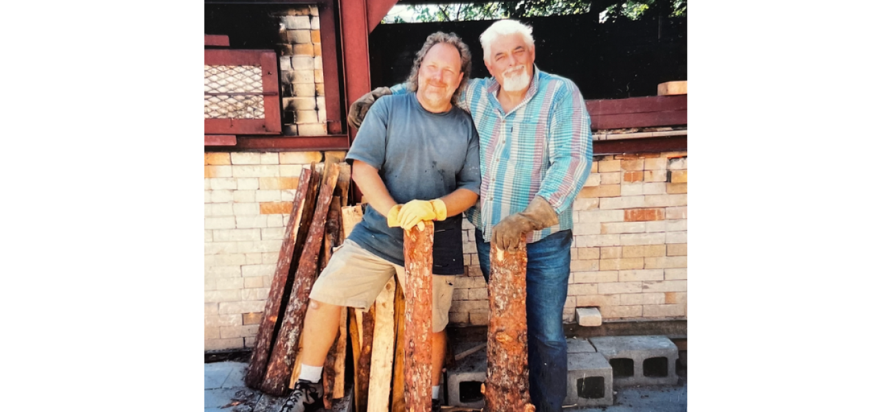 Robert Harrison and Robert Archambeau wood firing at the University of Manitoba