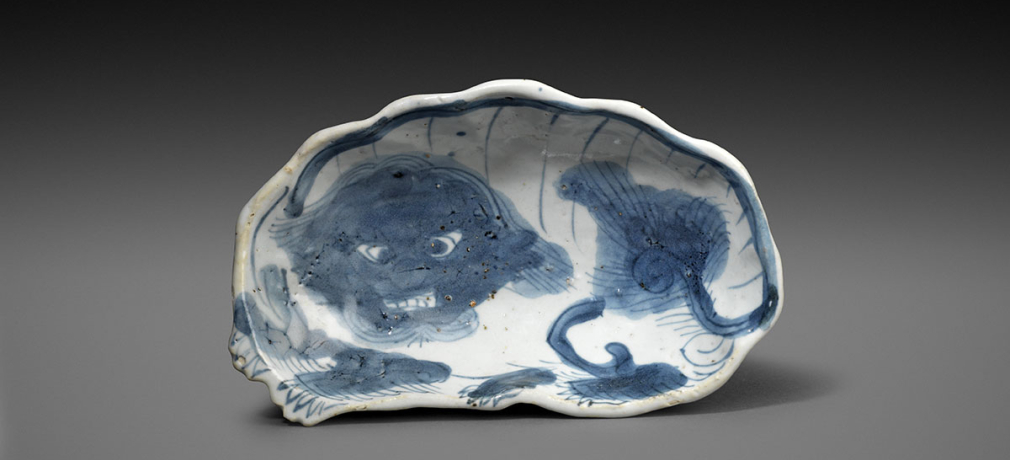 Buddhist Lion-Shaped Dish. Chinese, Ming dynasty, Tianqi period (1621-1627). Porcelain decorated in underglaze cobalt blue, approx. 2 x 7 x 4 in. Exhibited in Ko-Sometsuke. Chinese Porcelain for the Japanese Market.