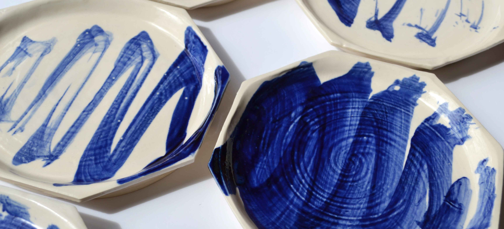 Digital Calligraphy, 2015. CNC painted plates with handmade brush. Porcelain, cobalt, glaze, 8x8x1 in. Photo by artist.
