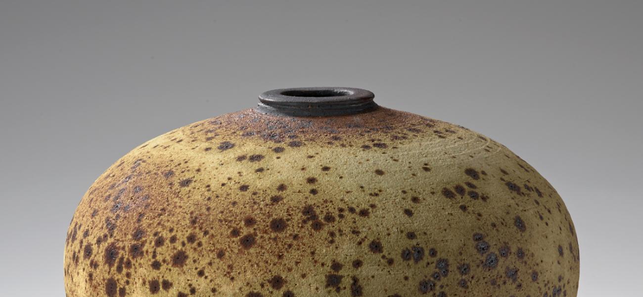 Vivika and Otto Heino. Vase, 1980s. Stoneware with Hawaiian black sand, apple-ash glaze, black slip. 8.25 x 10.25 in. 