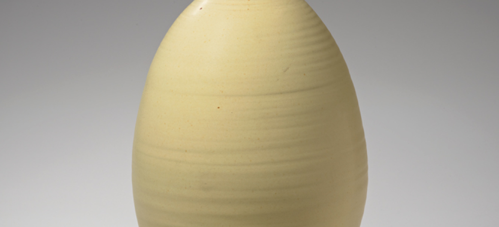 Otto Heino. Vase, 2002. Porcelain bottle with Otto's prized Chinese yellow matte glaze, which he perfected shortly after Vivika's death. 13 x 7.63 in.
