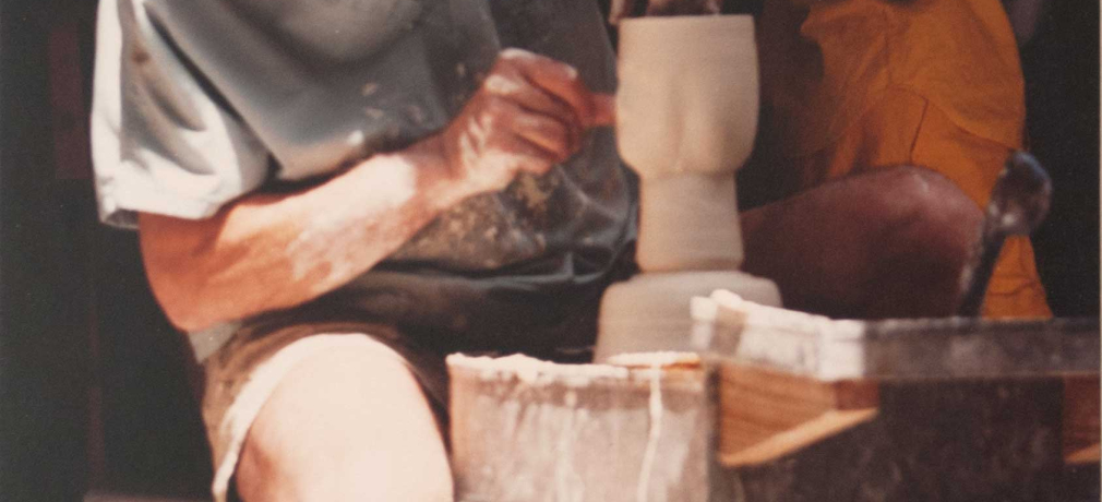Harry Holl at his potters wheel, 1980s. Photograph by Norman Shire.