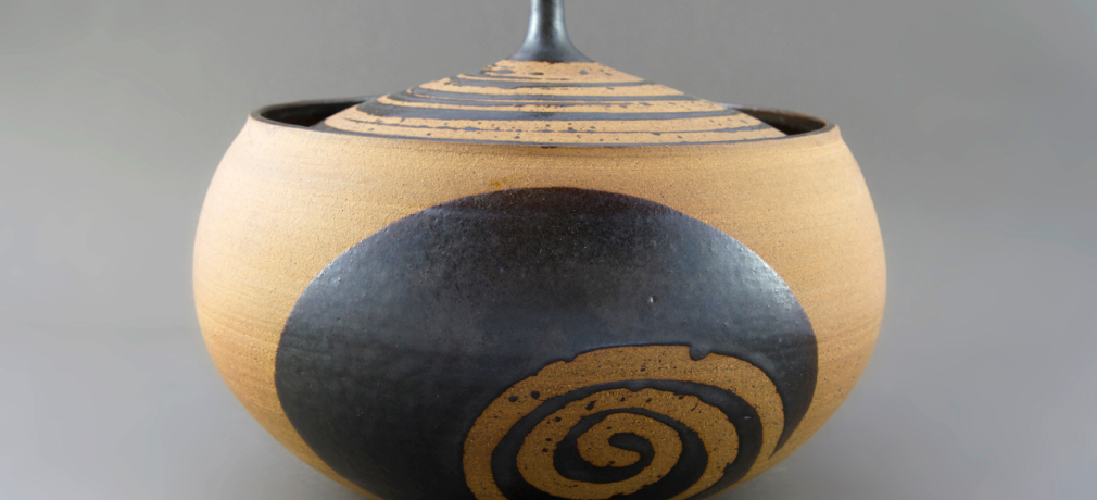 Joan Pearson Watkins. Brown Bowl with Lid. Earthenware, glaze; 8.75 x 5 in. Collection of the Nora Eccles Harrison Museum of Art, Utah State University, Logan, Utah. Photograph by Jackie Lupica.