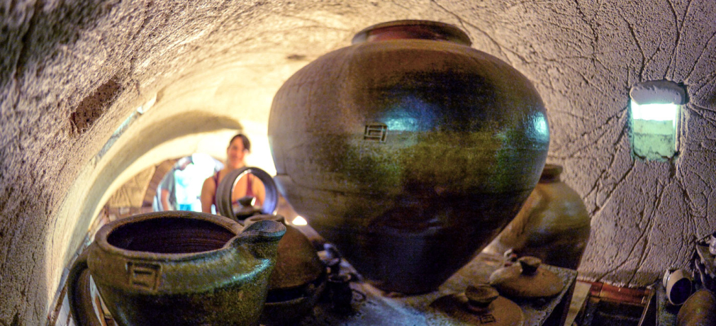 Inside Kevin Crowe's kiln just after the first firing of his rebuilt anagama kiln. Ty River Pottery, Amherst, Virginia. Photograph by Peter Rausse, 2015.