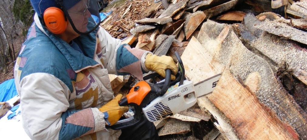 Magnusson effortlessly wielding her sharp-bladed chainsaw.