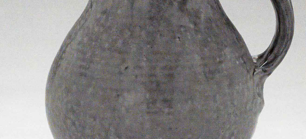 Jug, March 2005. Cone 10 woodfired stoneware, ash glaze over porcelain slip. H 7.5" x W 6". Photograph by VanZandenbergen.