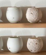 Details of cups from 365 piece installation “A Year and A Day” in the gallery. Image courtesy of Ty and Chey.