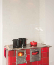 Jessica Steinhäuser. Red-glazed kachelöfen with cookstove and baking oven. 