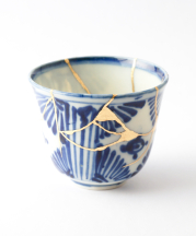 Antique Japanese kintsugi soba cup restored with gold. Photo by Marco Montalti
