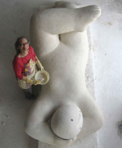 Joy Brown working on a plaster form to be cast in bronze, 2014.