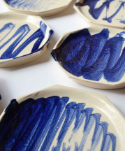 Digital Calligraphy, 2015. CNC painted plates with handmade brush. Porcelain, cobalt, glaze, 8x8x1 in. Photo by artist.