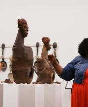 Donna Ray introducing "The Three Goddesses" at her gallery talk.