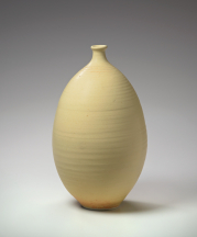 Otto Heino. Vase, 2002. Porcelain bottle with Otto's prized Chinese yellow matte glaze, which he perfected shortly after Vivika's death. 13 x 7.63 in.