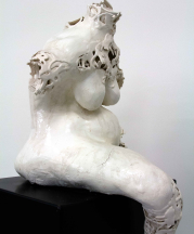 Olgu Sümengen Berker. Seated Figure, 2011. Slip-cast white clay, transparent glaze, fired to 1040 C., 13 x 16 x 20 in. Photo by artist. 