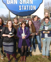 Leah Leitson and Warren Wilson students with pots they made for Gan Shan Station. Photograph by Stewart Young. 