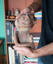 Santiago Isaza holding a Pre-Columbian figurative vessel from his collection. January, 2019. Photo by author.