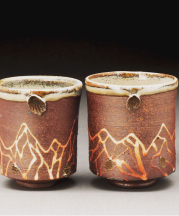 Jennifer Markmanrud. Mountain Cups, 2.75x 2.75x 3 in. Woodfired Stoneware. Photograph by Glen Scheffer. 