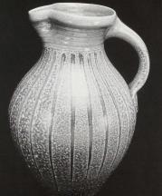 Gallon Pitcher. Kaolin slip drips with celadon glazed neck. 14 in. Wood fired. 1992. Photo Robin Alexander.