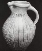 Gallon Pitcher. Kaolin slip drips with celadon glazed neck. 14 in. Wood fired. 1992. Photo Robin Alexander.