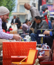 Nick Vest buying two objects at the Ghost Market  to start work with. Photo by Wu Fan