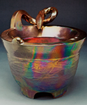 James C. Watkins. Guardian Series (detail), 2011. Double-walled caldron, fumed Cone 04 glaze, 21 x 21 in. Photograph by Jon Thompson.