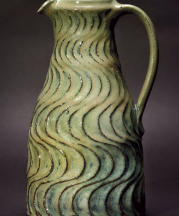 Willi Singleton. Woodfired Carved Pitcher, 2016. Hawk Mountain and Chesapeake clays, cornstalk ash glaze with copper. 11 x 6 x 5 in. Photograph by KenEk Photography.