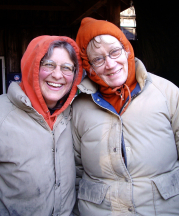 Paige Wilder, left, and the author, posing as twins at a firing in deep winter. Photo by Rolf Karlstrom, 2013.