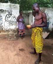 Vodu priest pouring libations, Kuli Village, Volta Region, Ghana.