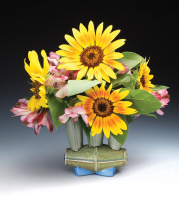 Frank Saliani, Vase with Sunflowers, 2014. Colored, cast and assembled porcelain, cone 6 oxidation. 5 x 5 x 3 in. Photo by artist.