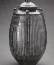 Grain Jar, March 2005. Cone 10 woodfired stoneware, ash glaze over porcelain and local clay slips. H 36" x W 16". Photograph by VanZandenbergen.
