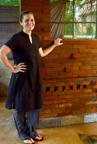 Meaghan Gates standing by the newly built kiln, Mananthavady, India, 2015. Photo by Jaya Kumar K.