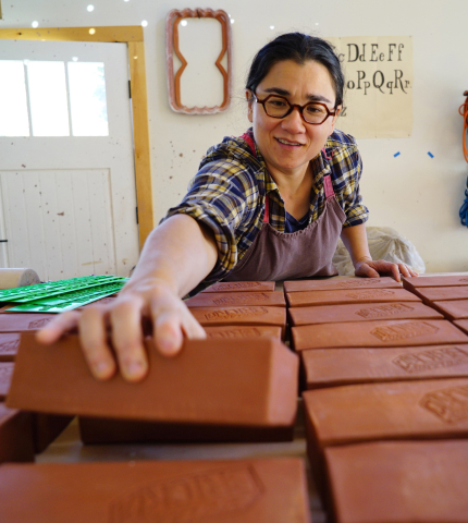 Ayumi Horie working on the Portland Brick Project