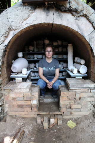 Kristin Muller in her anagama hybrid kiln built in 1995 by Okazaki Takao. Photo by Jacklyn Scott, 2016.