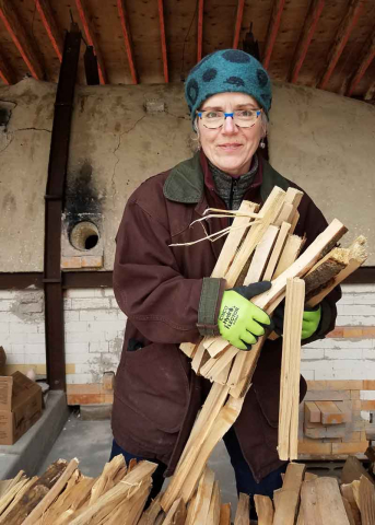 Maureen Mills gathers wood for the New Hampshire Institute of Art (NHIA) Fushigigama (wonder kiln) in Sharon, New Hampshire, 2018.