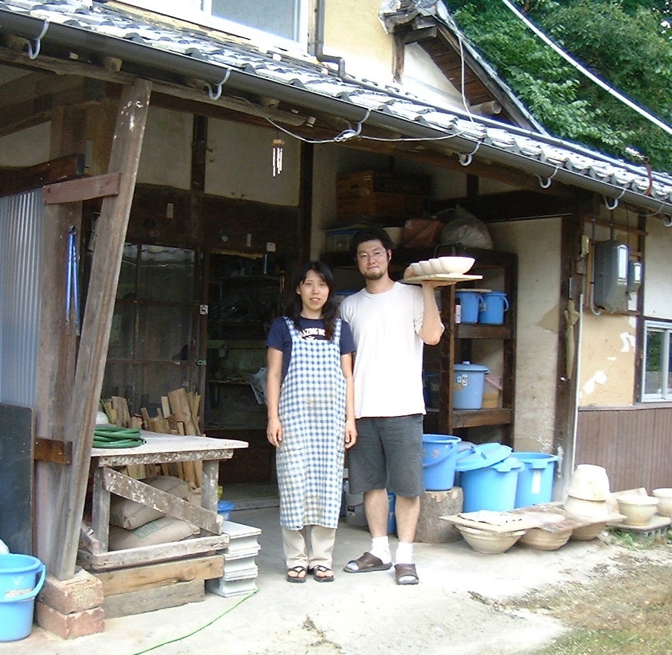 Hitomi and Takuro Shibata at our pottery studio in Shigaraki, photo taken circa 2001. 