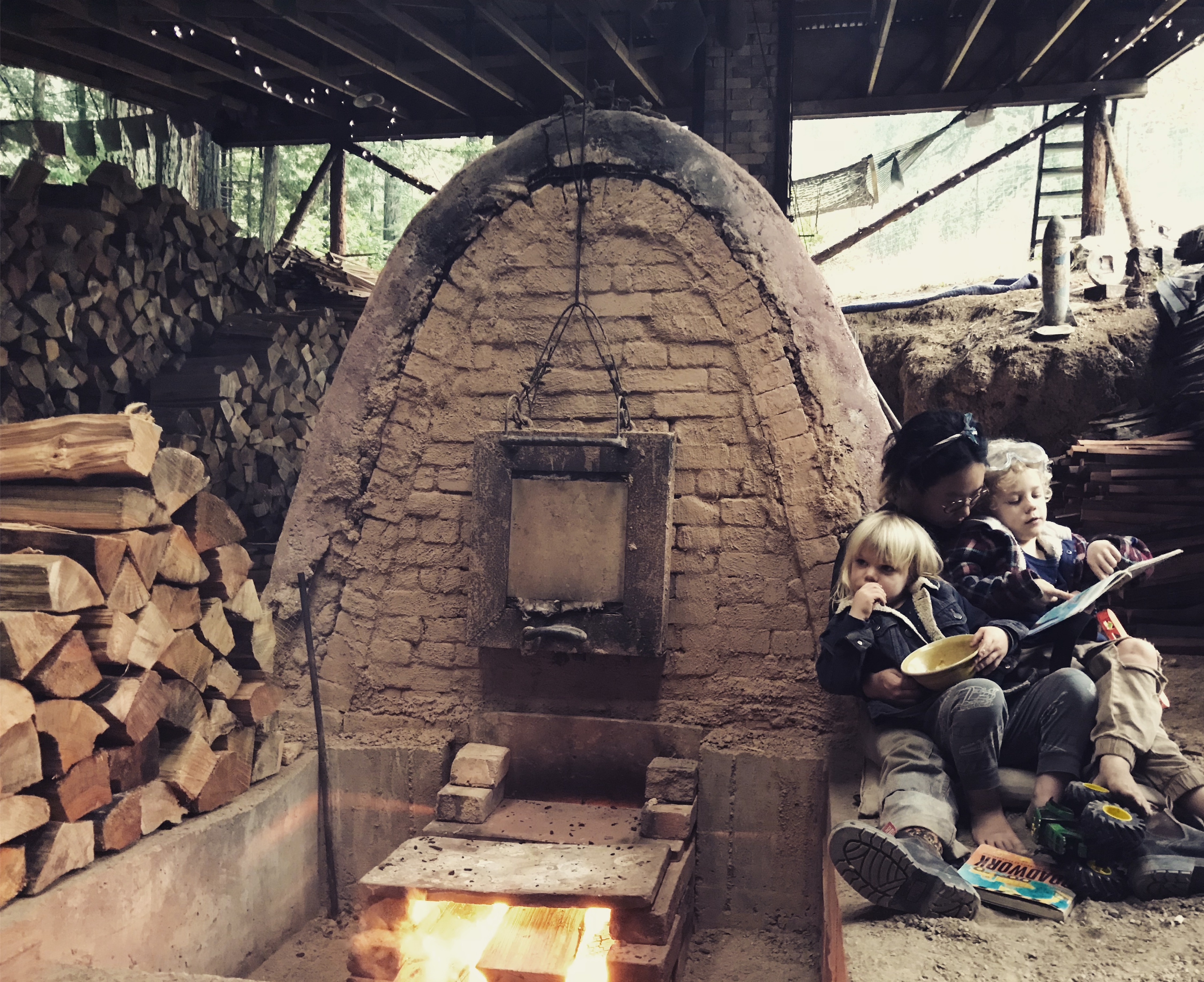 Story time, Flynn Creek Anagama at Nick Schwartz’s studio, Comptche, California, 2018, Photo Credit: Carey Nathanson.