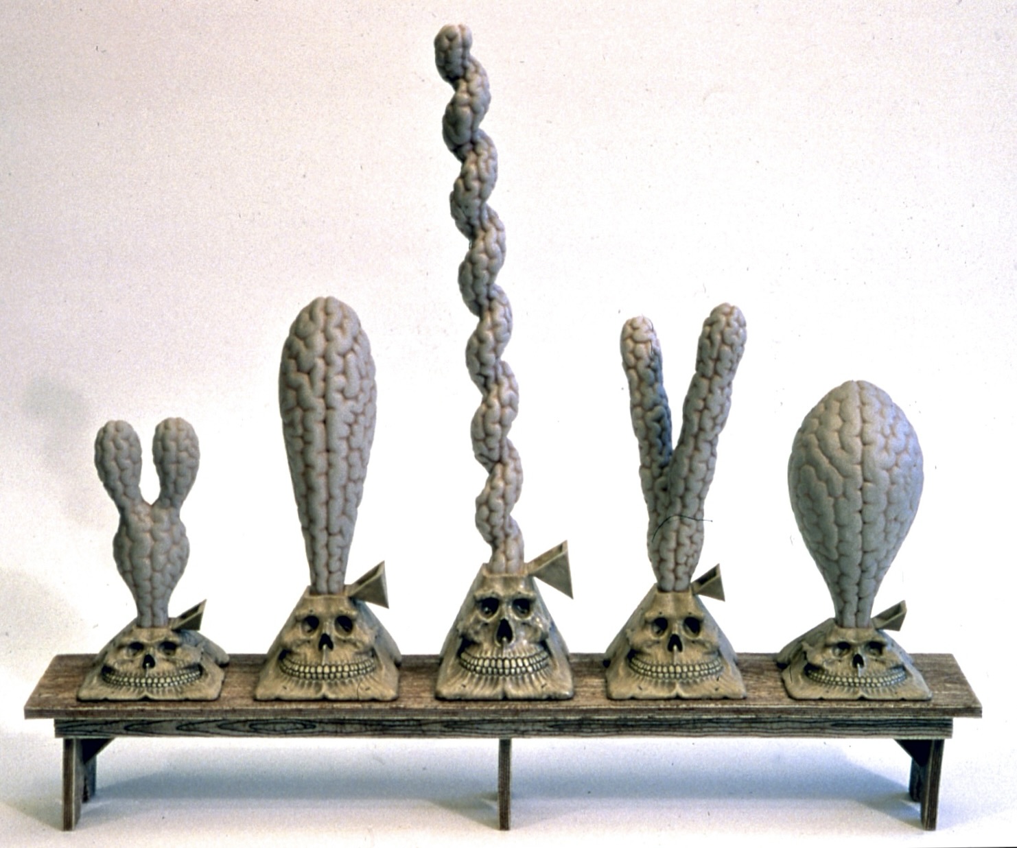 Demons of the Intellect (Professing to be Wise, They Became Fools), 1980, porcelain, glaze 9.5 x 11.5 x 2. Photo courtesy of Richard Notkin.