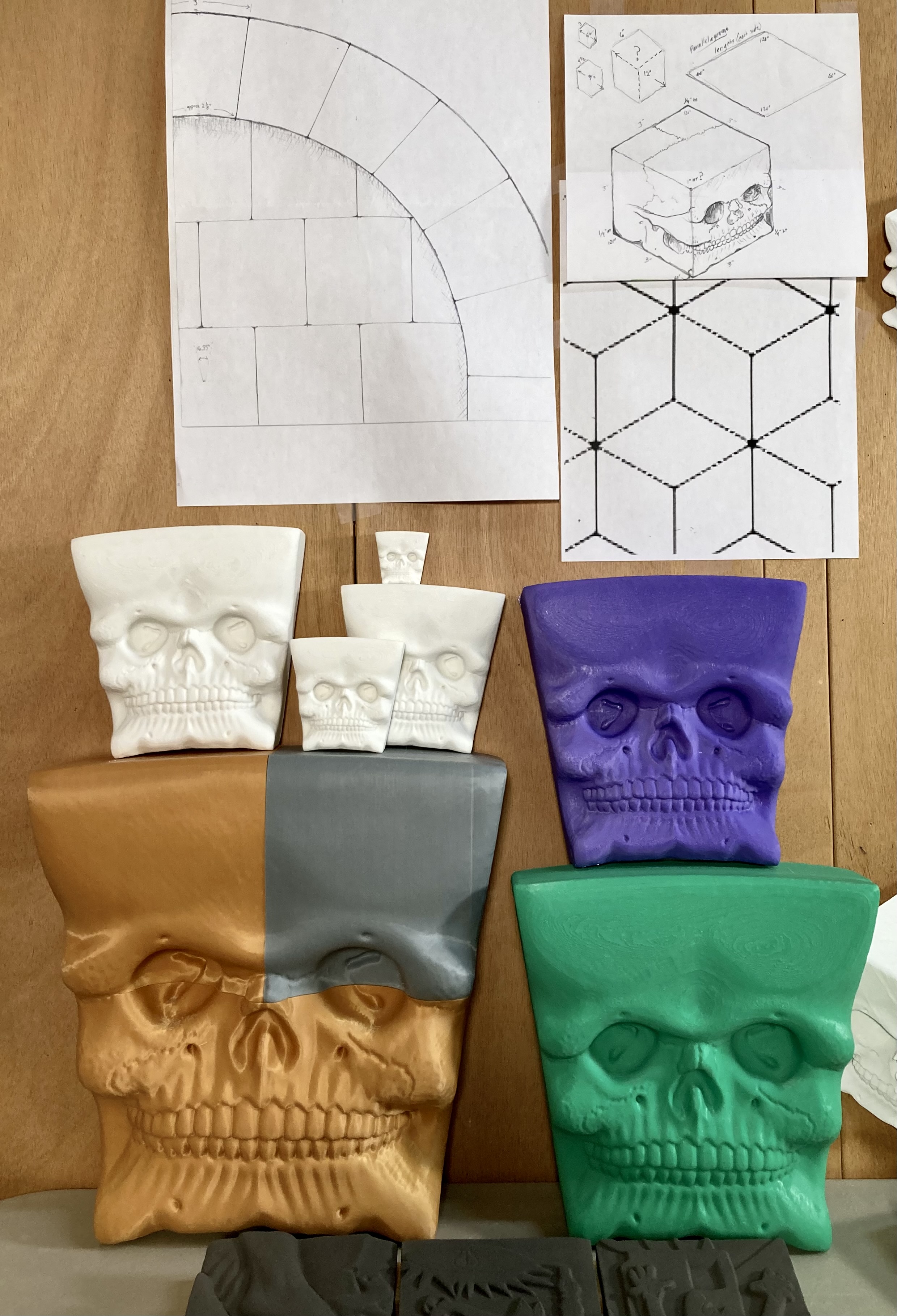 Digitally printed PLA prototype models of arched Cube Skull tile in different scales for mold-making, 2024. Photo courtesy of Richard Notkin.