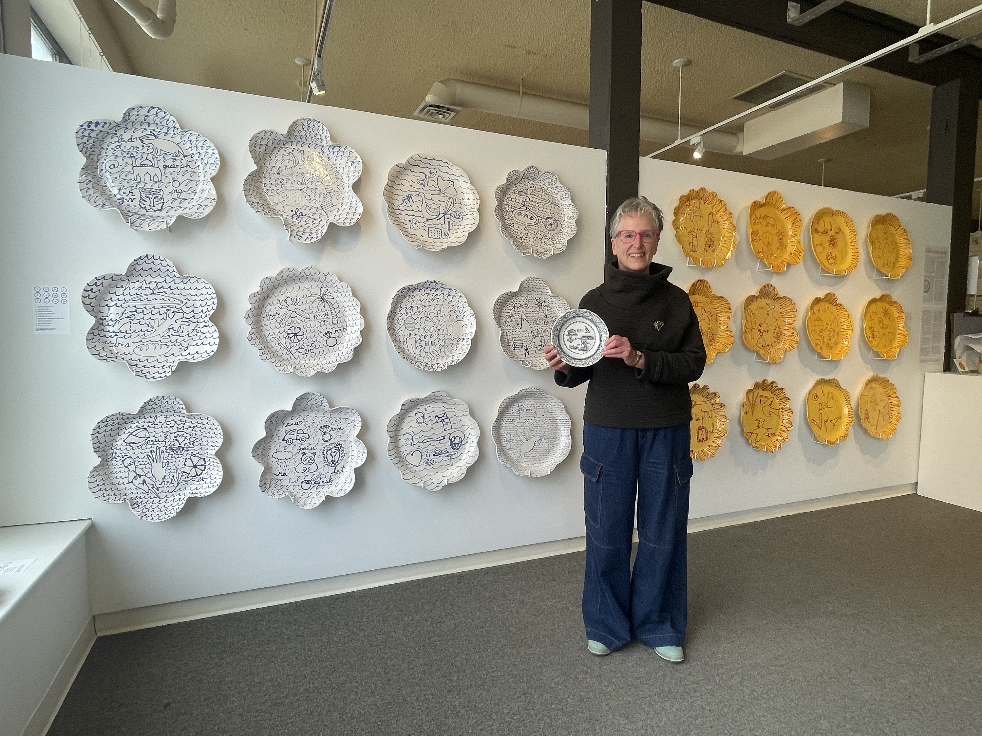 Mireille Perron and plates. On display at the Alberta Craft Council gallery in Edmonton, and will be seen in Calgary in 2026 (Date TBD).